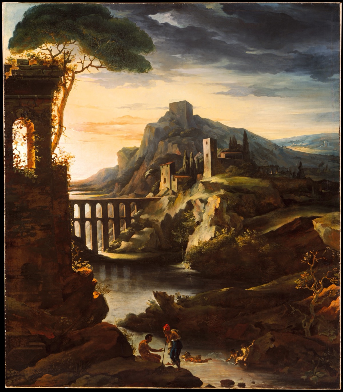 热里科《黄昏：风景与渡槽》：暮色中罗马式渡槽横贯画面，左侧废墟塔楼与松树剪影，落日金光与右侧蓝黑雨云对峙，前景河畔牧人与牛羊